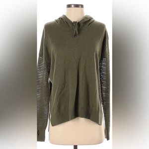 Green hooded sweater with arm and back detail.